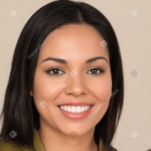 Joyful latino young-adult female with long  brown hair and brown eyes