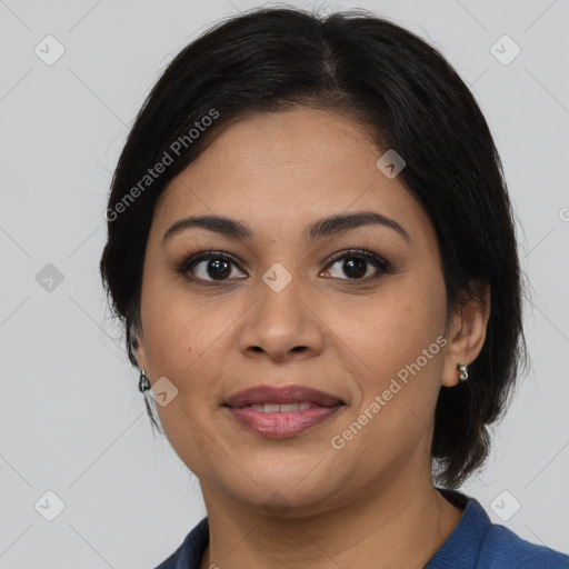 Joyful latino young-adult female with medium  brown hair and brown eyes