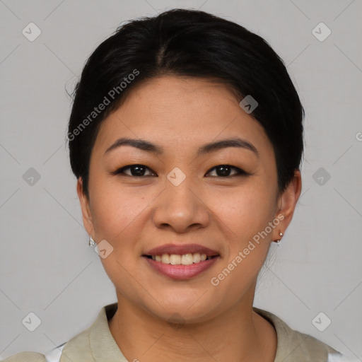 Joyful asian young-adult female with short  black hair and brown eyes