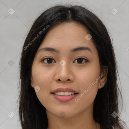 Joyful asian young-adult female with long  brown hair and brown eyes