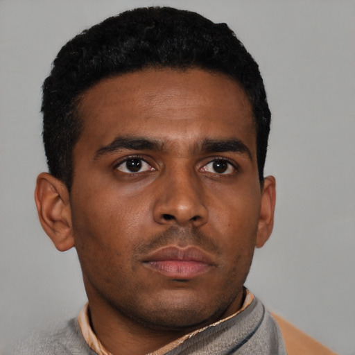 Neutral black young-adult male with short  brown hair and brown eyes