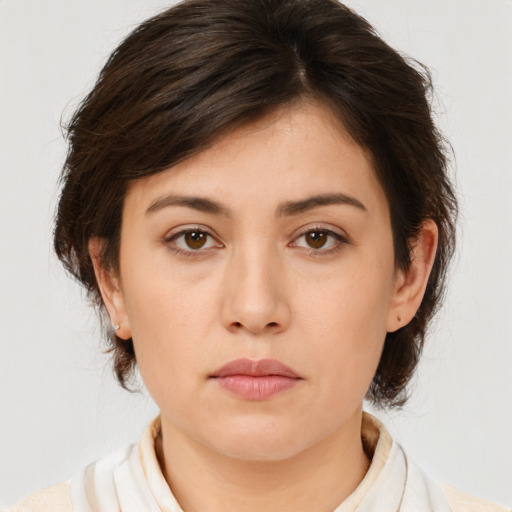Neutral white young-adult female with medium  brown hair and brown eyes