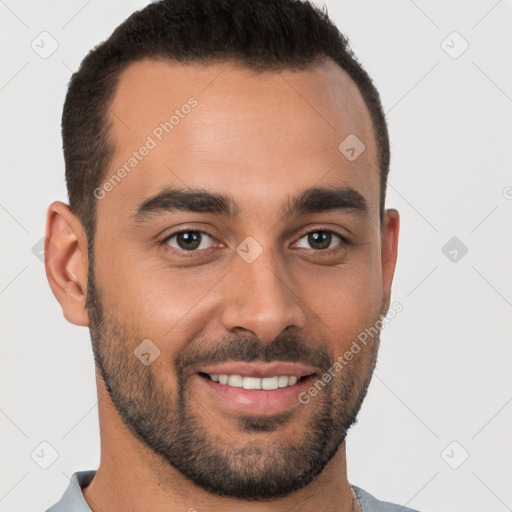 Joyful white young-adult male with short  brown hair and brown eyes