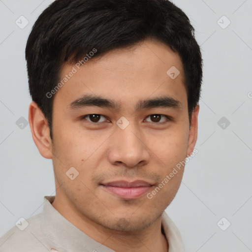 Joyful latino young-adult male with short  brown hair and brown eyes