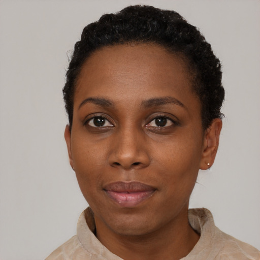 Neutral black young-adult female with short  black hair and brown eyes