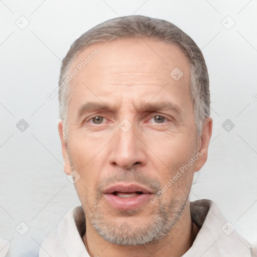 Neutral white adult male with short  brown hair and brown eyes