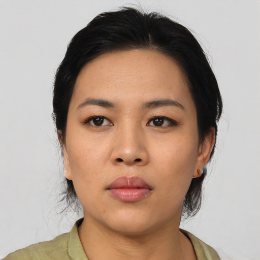 Neutral asian young-adult female with medium  black hair and brown eyes