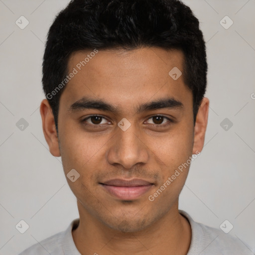 Joyful latino young-adult male with short  black hair and brown eyes