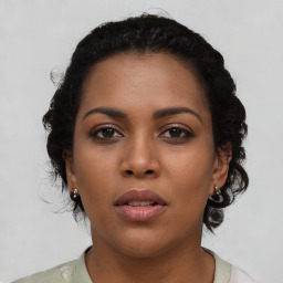 Neutral black young-adult female with short  brown hair and brown eyes