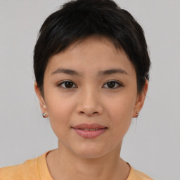 Joyful asian young-adult female with short  brown hair and brown eyes