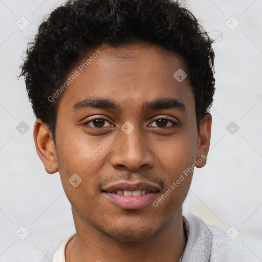 Joyful latino young-adult male with short  brown hair and brown eyes