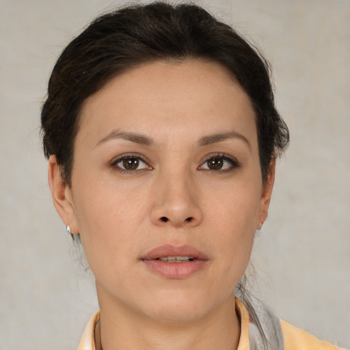 Neutral asian young-adult female with short  brown hair and brown eyes