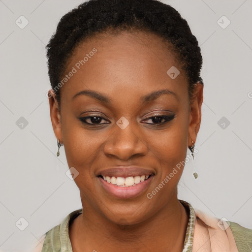 Joyful black young-adult female with short  brown hair and brown eyes