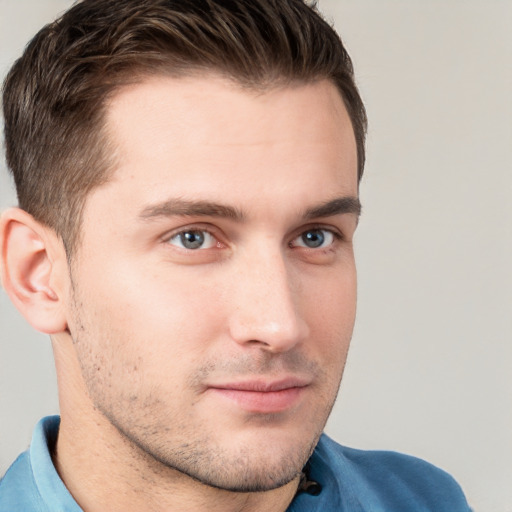 Neutral white young-adult male with short  brown hair and grey eyes