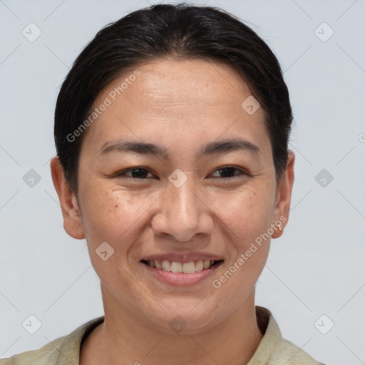 Joyful white adult female with short  brown hair and brown eyes