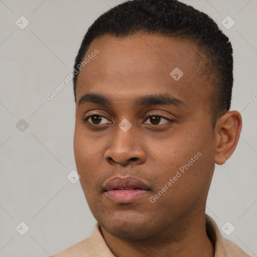 Neutral black young-adult male with short  black hair and brown eyes