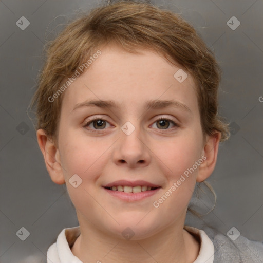 Joyful white child female with short  brown hair and brown eyes