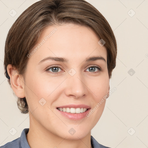 Joyful white young-adult female with short  brown hair and grey eyes