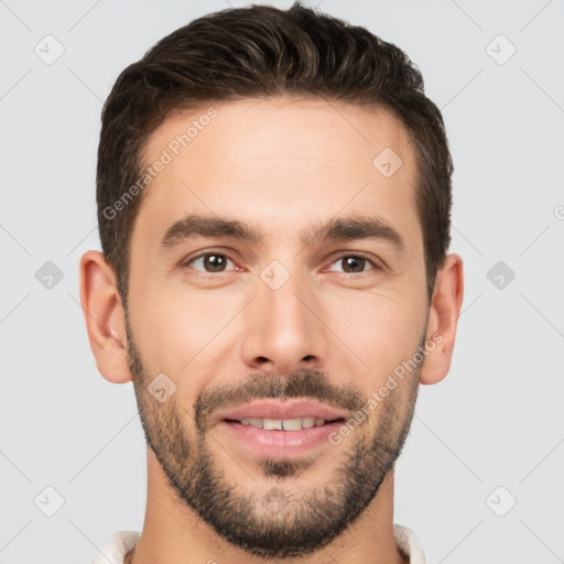 Joyful white young-adult male with short  brown hair and brown eyes