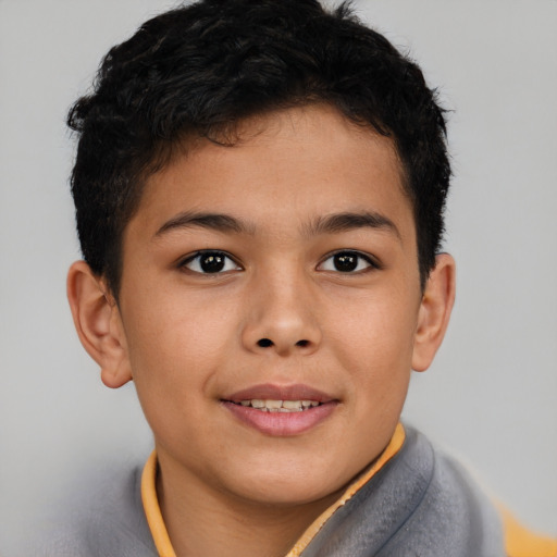 Joyful asian child male with short  brown hair and brown eyes