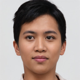 Joyful asian young-adult female with short  black hair and brown eyes