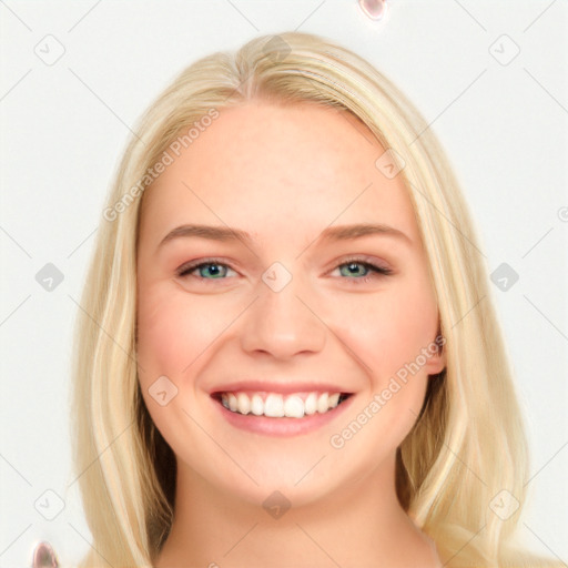 Joyful white young-adult female with long  brown hair and blue eyes