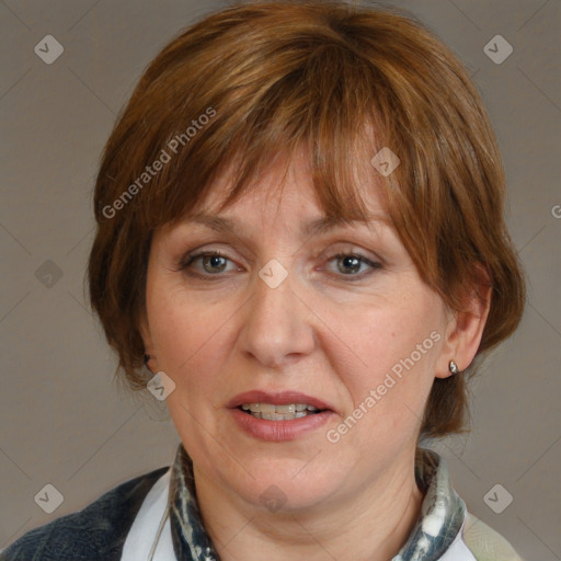 Joyful white adult female with medium  brown hair and blue eyes