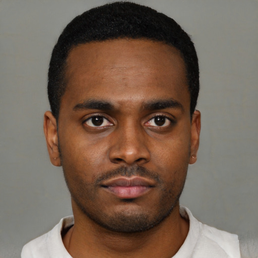 Neutral black young-adult male with short  black hair and brown eyes