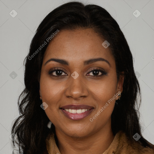 Joyful black young-adult female with long  brown hair and brown eyes