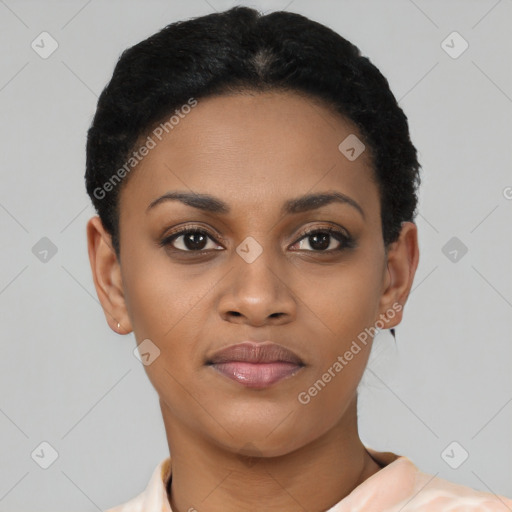 Joyful black young-adult female with short  black hair and brown eyes