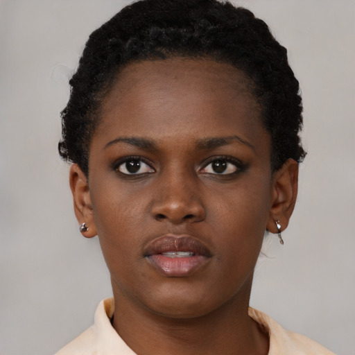 Neutral black young-adult female with short  brown hair and brown eyes