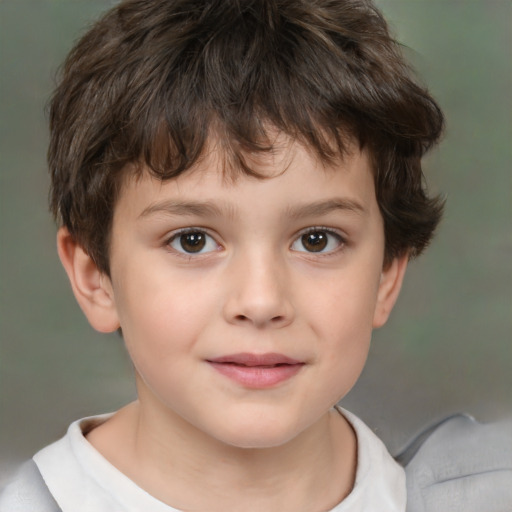 Joyful white child male with short  brown hair and brown eyes