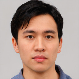 Neutral asian young-adult male with short  brown hair and brown eyes