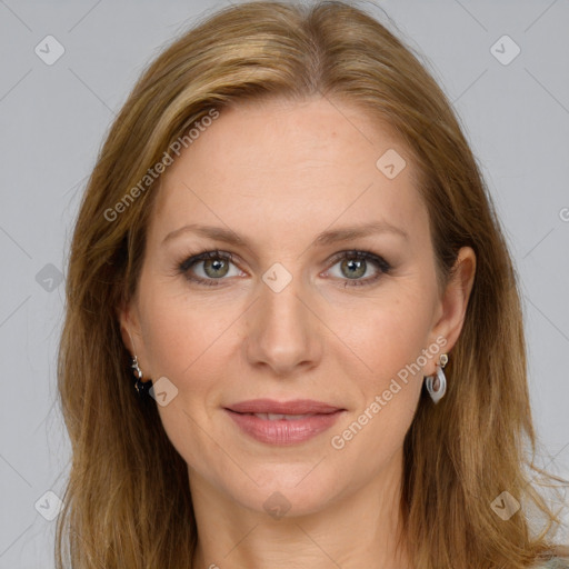 Joyful white adult female with long  brown hair and brown eyes