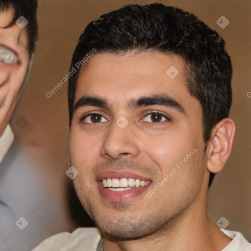 Joyful white young-adult male with short  black hair and brown eyes