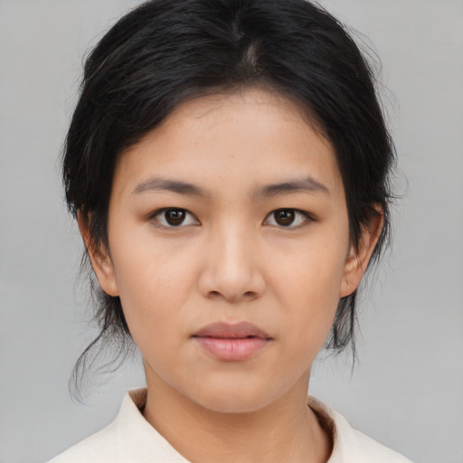 Neutral asian young-adult female with medium  brown hair and brown eyes