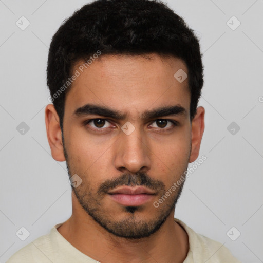 Neutral latino young-adult male with short  black hair and brown eyes