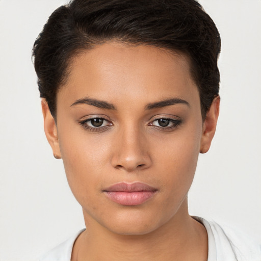 Neutral white young-adult female with short  brown hair and brown eyes