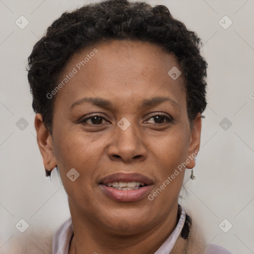Joyful latino adult female with short  brown hair and brown eyes