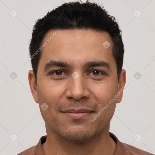 Joyful white young-adult male with short  black hair and brown eyes