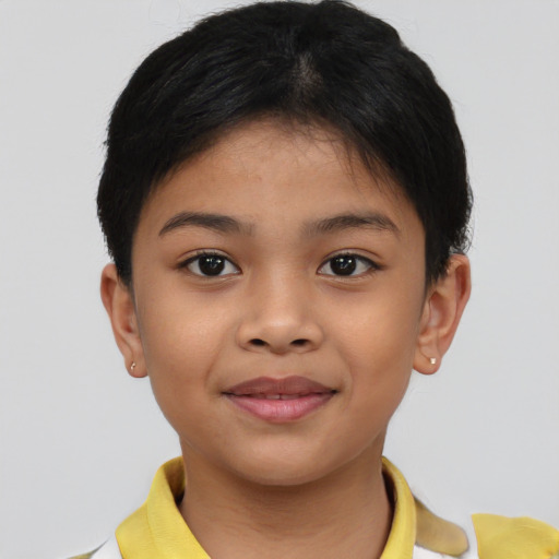 Joyful asian child female with short  brown hair and brown eyes