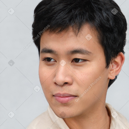 Neutral asian young-adult male with short  black hair and brown eyes