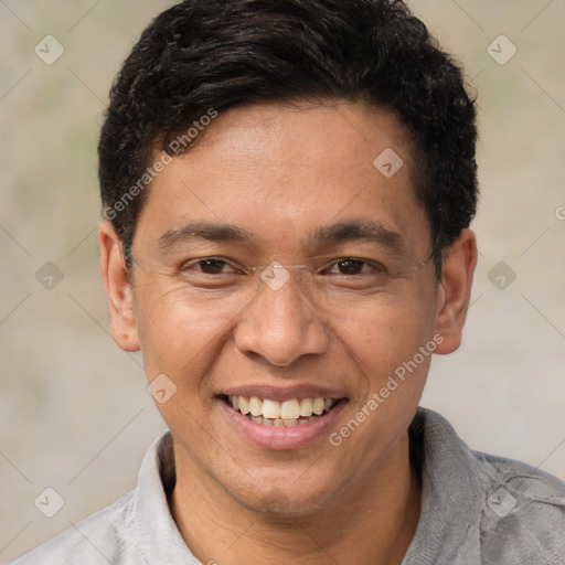 Joyful white adult male with short  brown hair and brown eyes