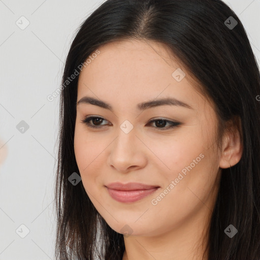 Joyful asian young-adult female with long  brown hair and brown eyes