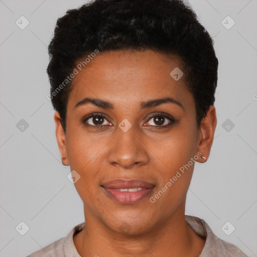 Joyful black young-adult female with short  black hair and brown eyes