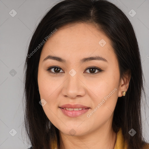 Joyful latino young-adult female with long  brown hair and brown eyes