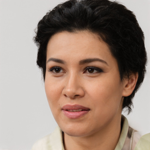 Joyful latino young-adult female with medium  black hair and brown eyes