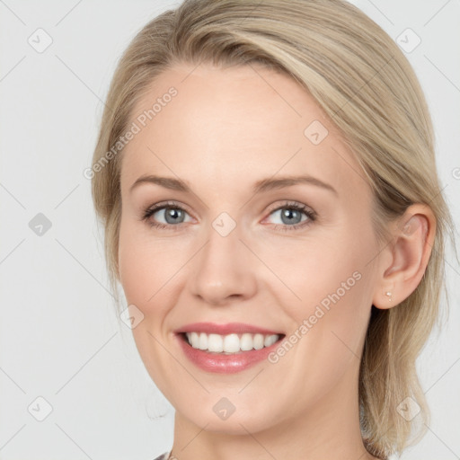 Joyful white young-adult female with long  brown hair and blue eyes