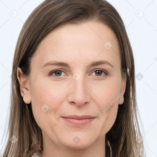 Joyful white young-adult female with long  brown hair and grey eyes