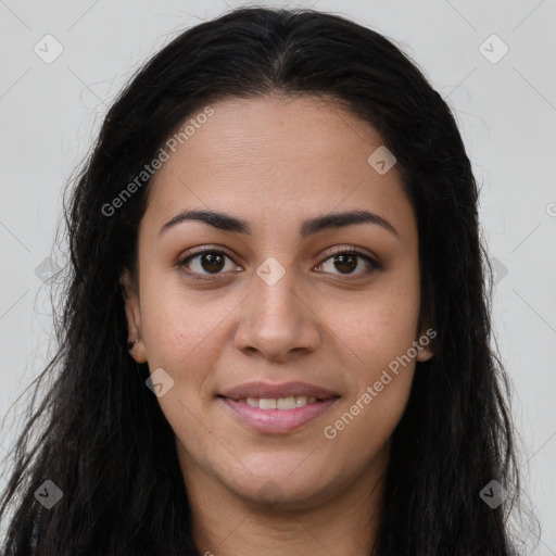 Joyful latino young-adult female with long  brown hair and brown eyes